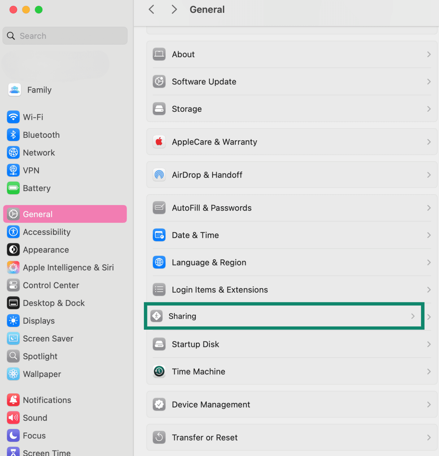macOS settings showing Sharing option.
