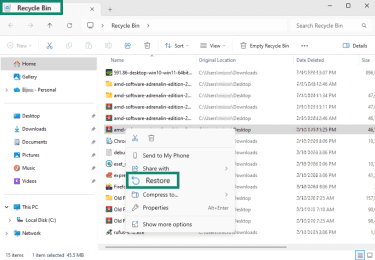 Recycle Bin on Windows showing the "Restore" option for a deleted file.